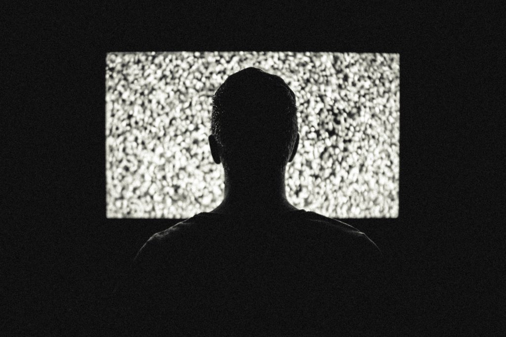 Canva-Silhouette-of-Man-in-Front-of-Tv-1024x683
